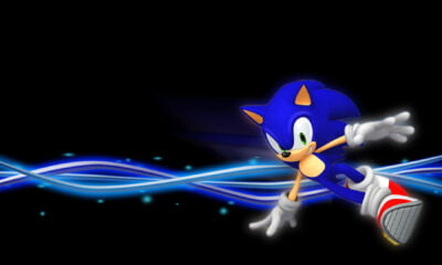 Sonic the Hedgehog from SEGA with a black ground with flashing blue colour from Sonic body to the right and left side of the screen like effect from a star trek movie and Sonic has a black background and Sonic is blue and peach coloured skin and fur and has red and white skater style shoes