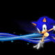 Sonic the Hedgehog from SEGA with a black ground with flashing blue colour from Sonic body to the right and left side of the screen like effect from a star trek movie and Sonic has a black background and Sonic is blue and peach coloured skin and fur and has red and white skater style shoes